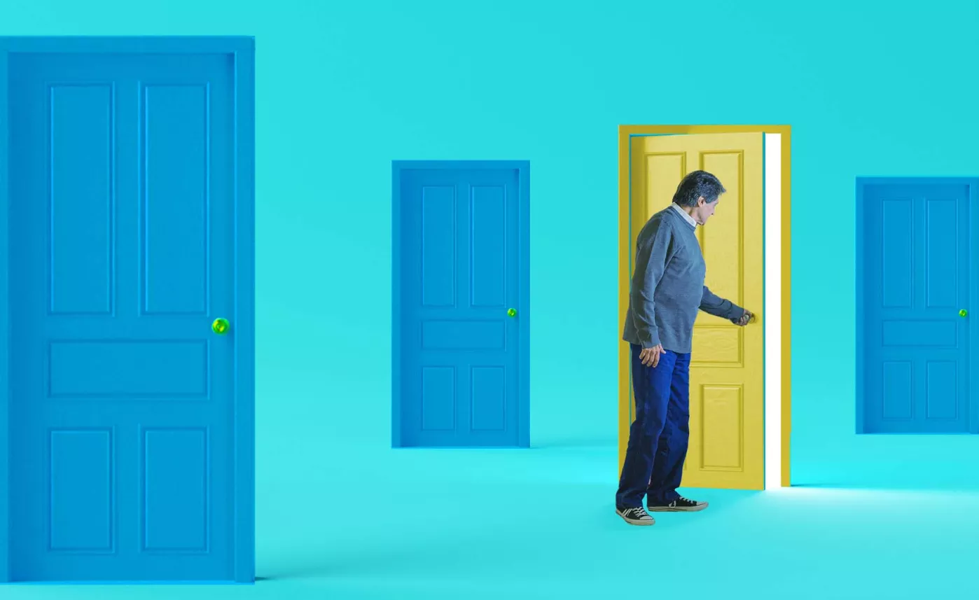  Man going through door
