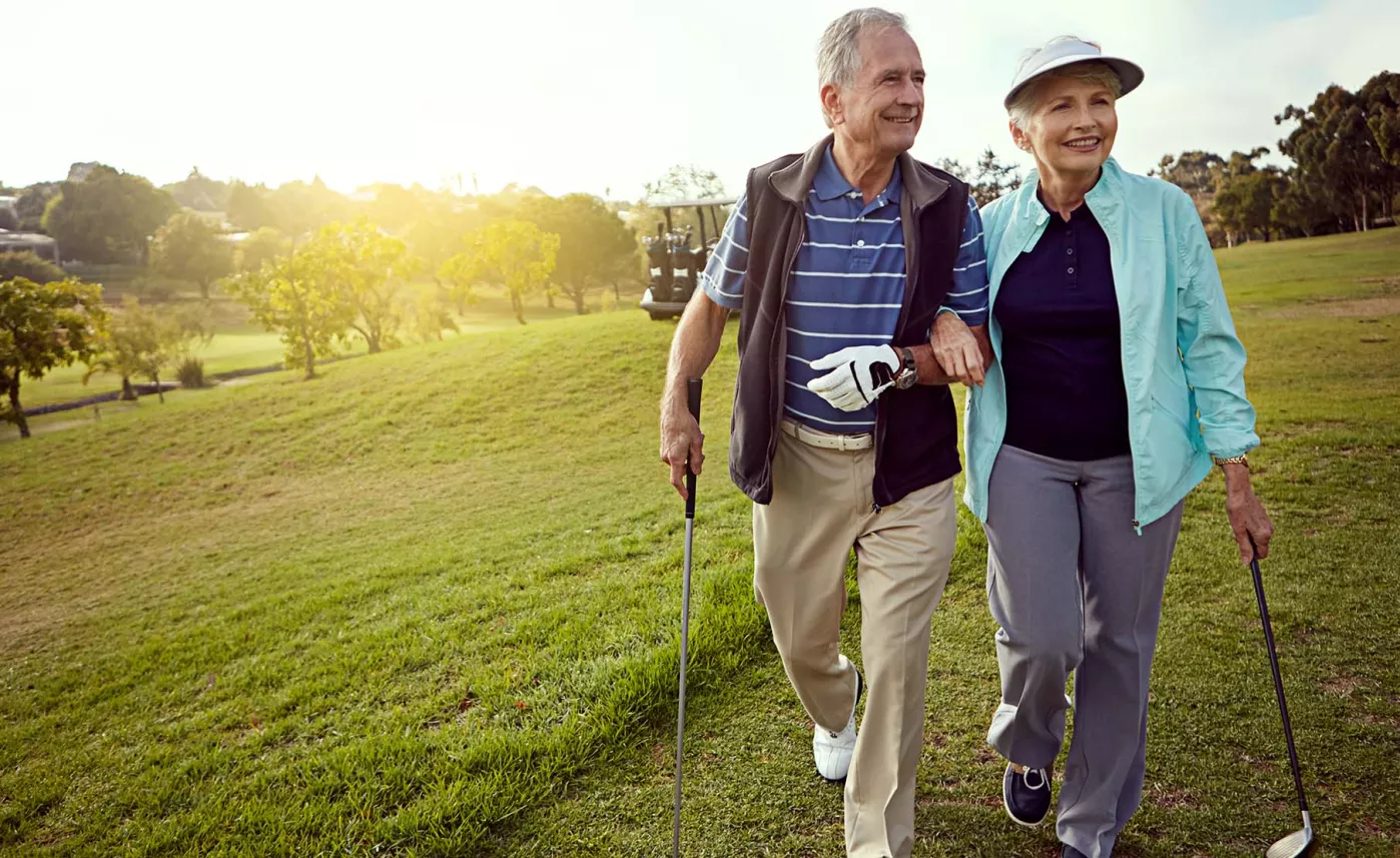  Couple roaming in golf court
