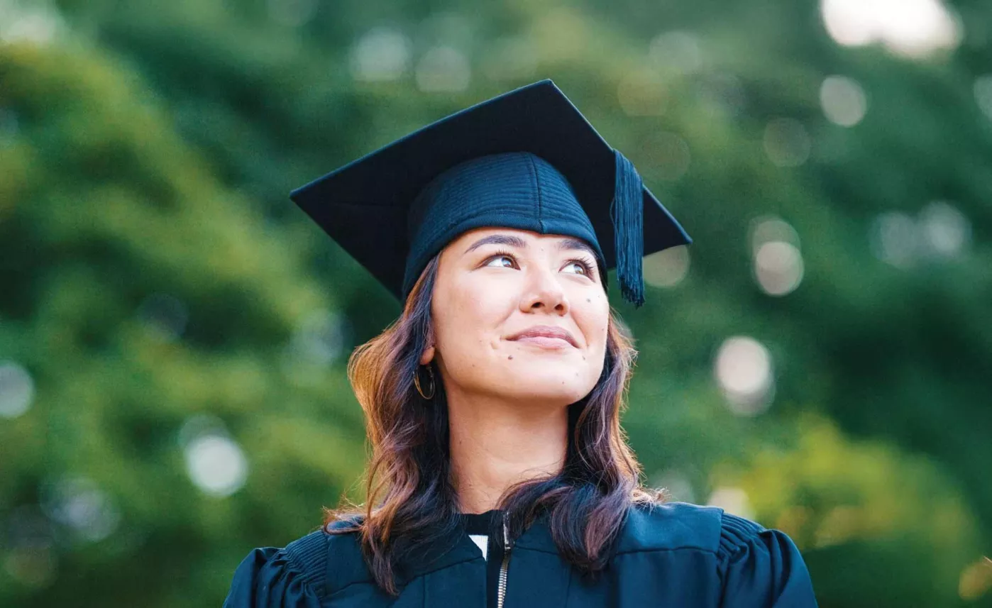  Graduate in cap and gown
