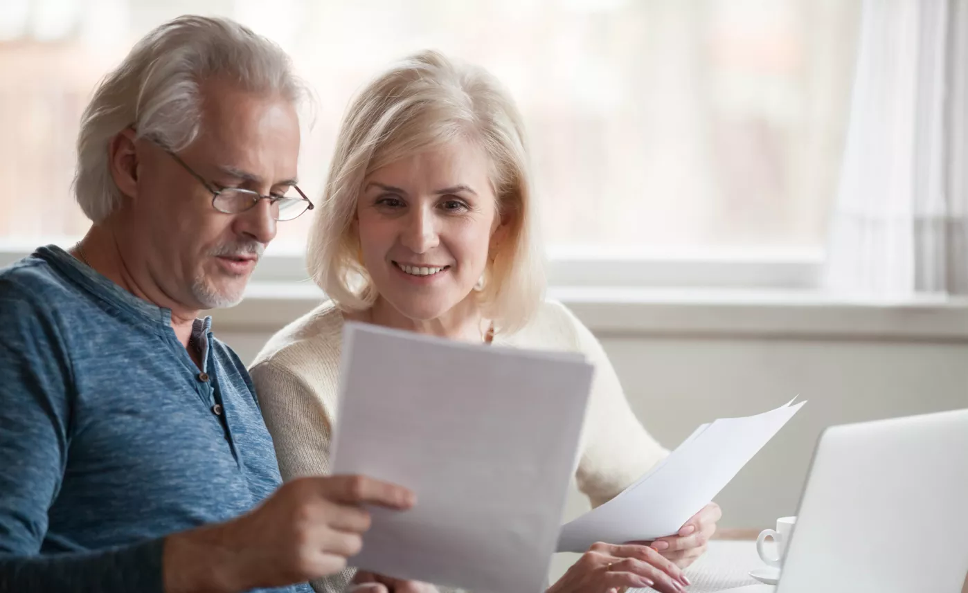 An older couple nearing retirement weighing their financial options
