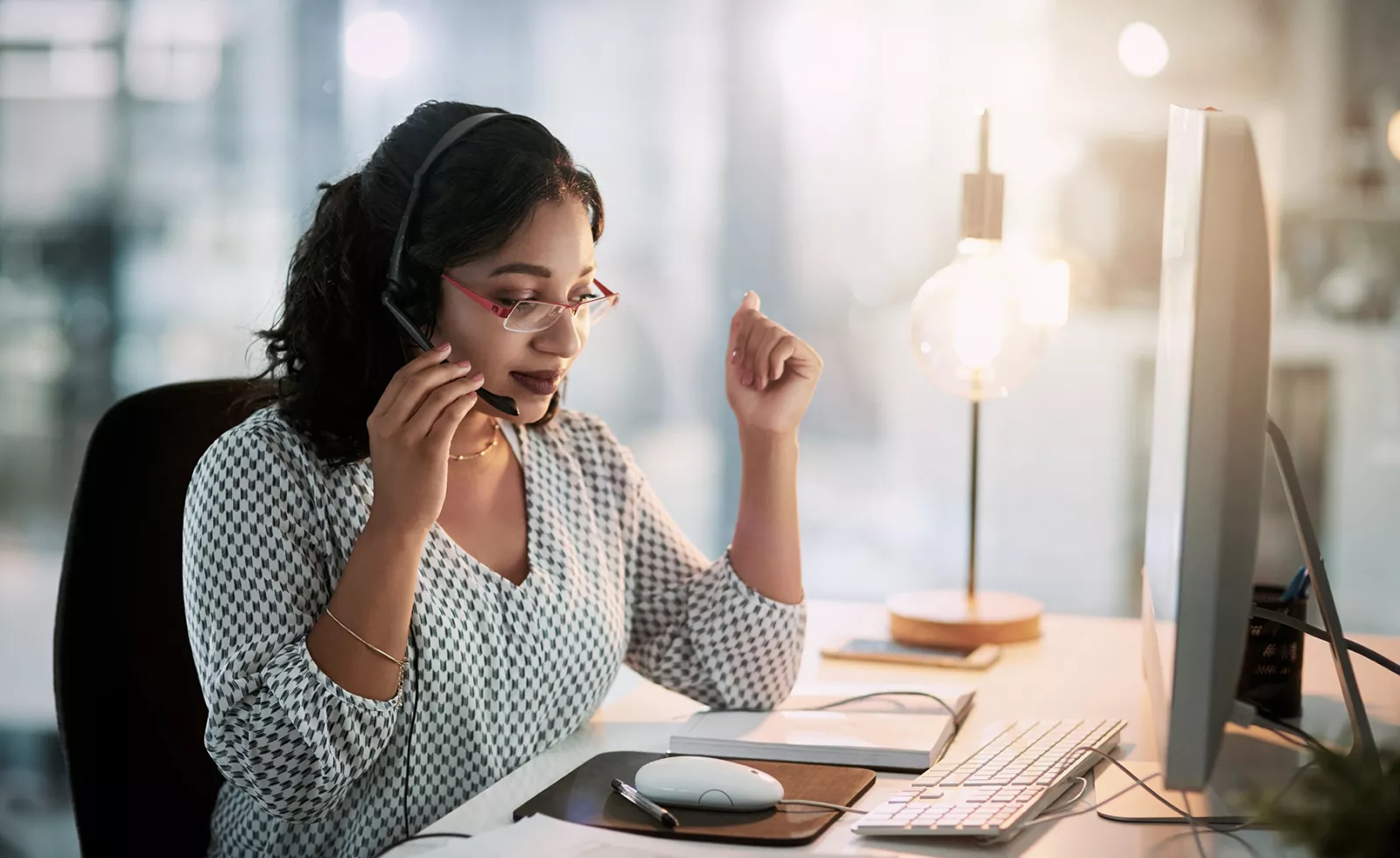  A business owner discusses potential 401(k) plans for her employees.
