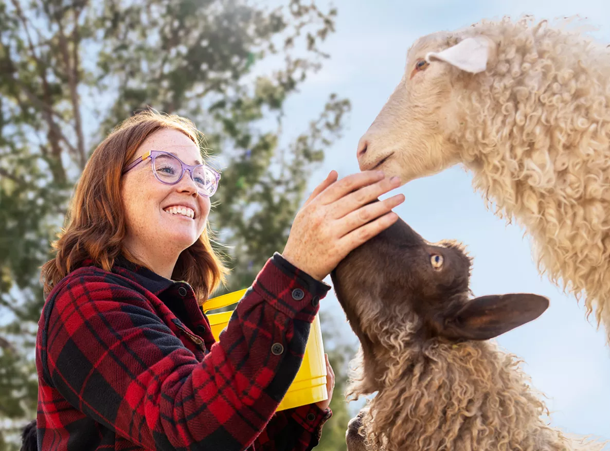  women playing with animals
