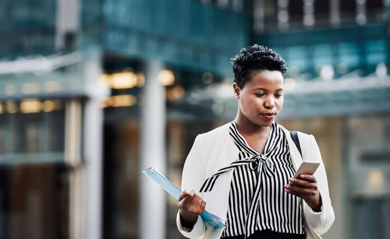 A woman uses mobile banking.