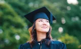 graduate in cap and gown
